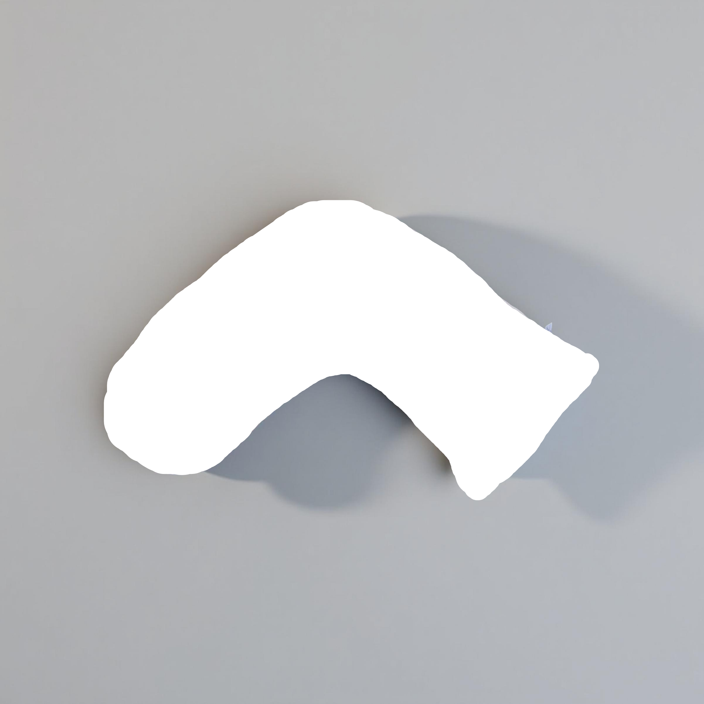 Luna Lullaby A beige, V-shaped nursing pillow on a grey background.