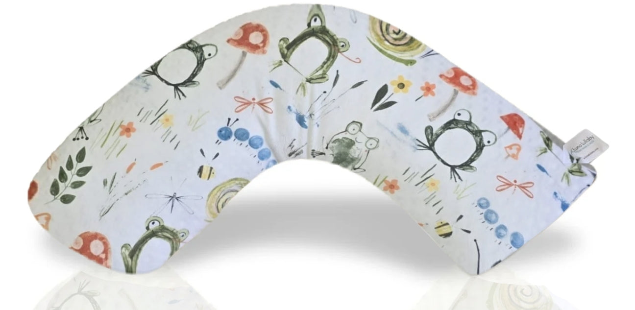 Nursing pillow with frog and friends pattern on a white background