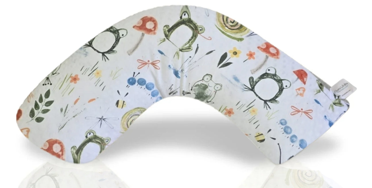 Nursing pillow with frog and friends pattern on a white background